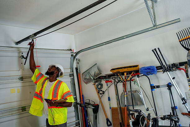 Professional Garage Door Roller Replacement technician working in Spirit Lake, IA